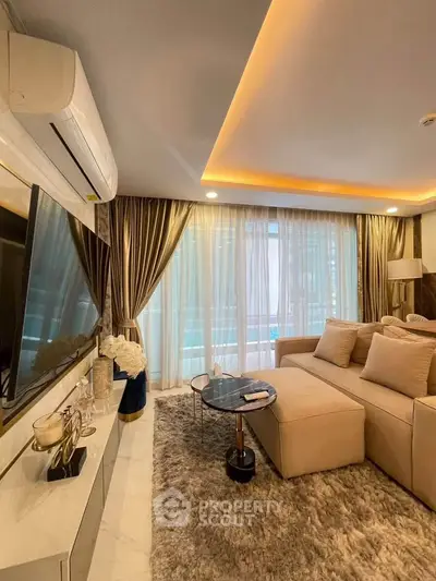 Luxurious living room with modern decor, plush sofa, and ambient lighting.