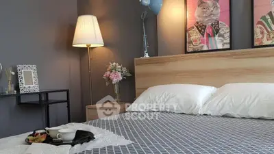 Cozy bedroom with stylish decor and elegant lighting