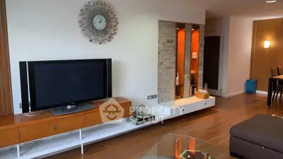 Modern living room with stylish decor and wooden flooring