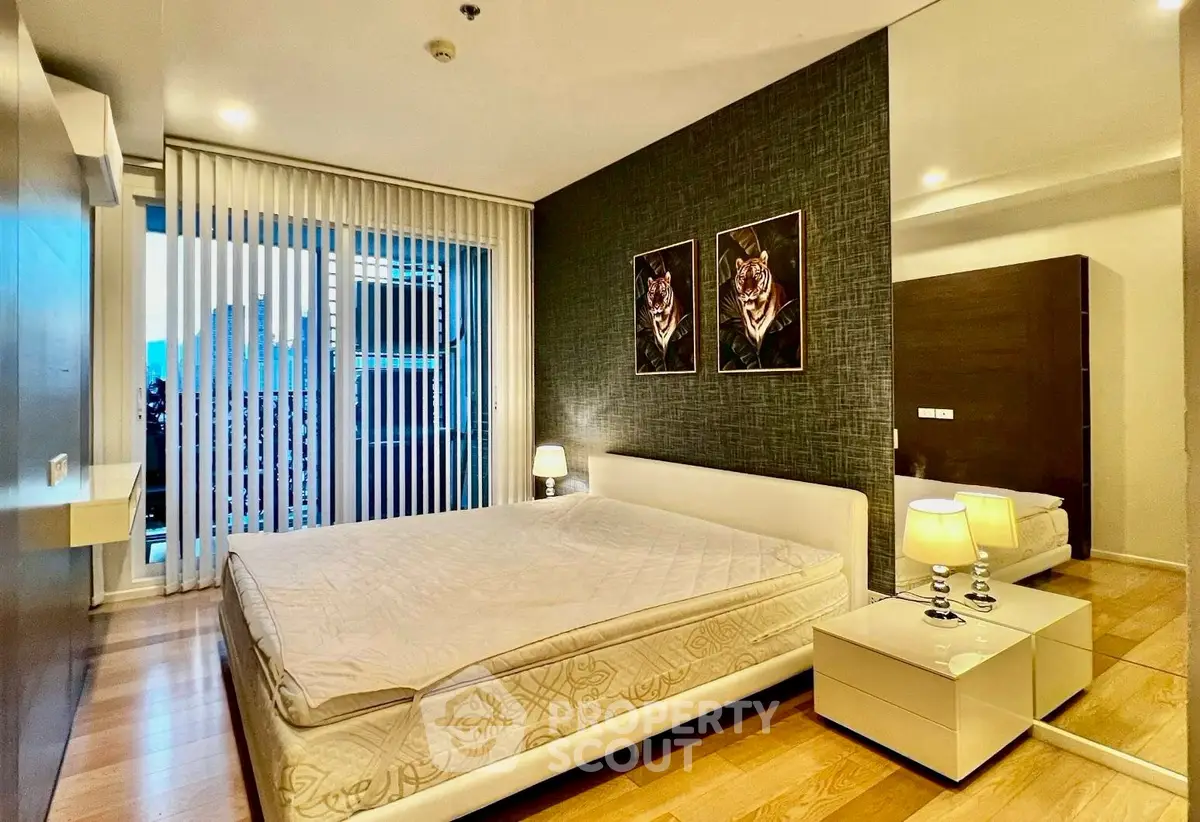 Luxurious modern bedroom with stylish decor and city view