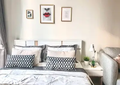 Stylish bedroom with modern decor and cozy ambiance, perfect for relaxation and comfort.