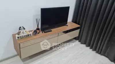 Modern living room with sleek TV stand and elegant decor