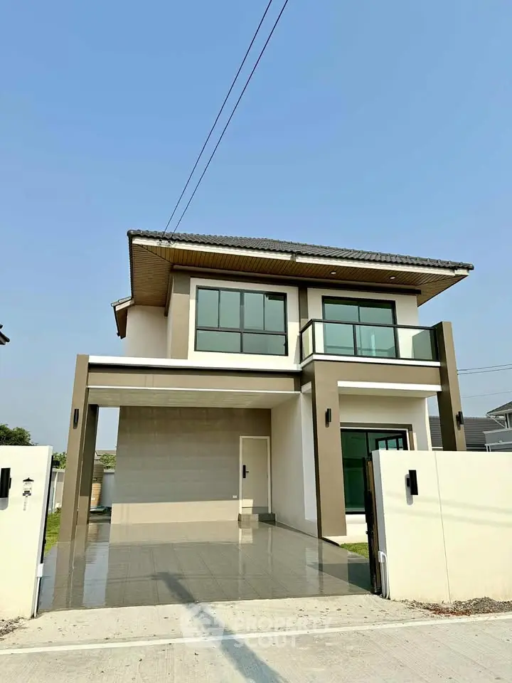 Modern two-story house with sleek design and spacious driveway