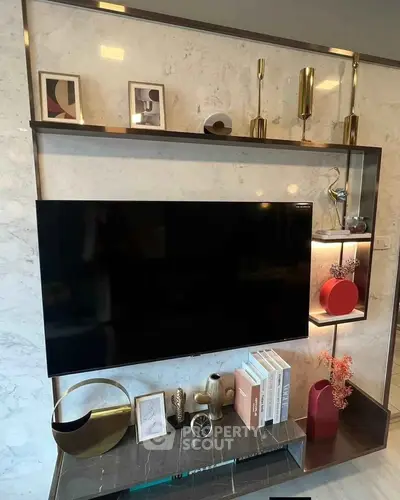 Stylish modern living room with wall-mounted TV and elegant decor