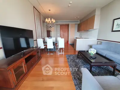 Spacious modern living room with open kitchen and elegant dining area