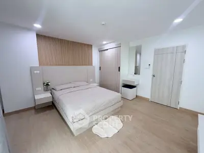 Modern minimalist bedroom with sleek design and neutral tones