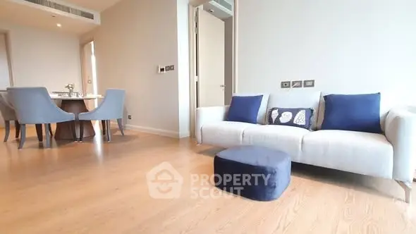 Modern living room with elegant dining area and stylish decor