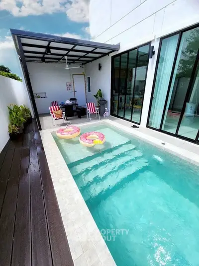 Modern home with private pool and stylish patio, perfect for relaxation and entertainment.