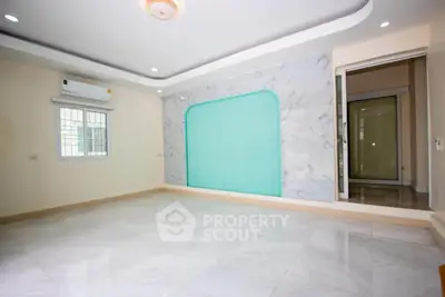 Spacious empty room with elegant marble flooring and modern ceiling design