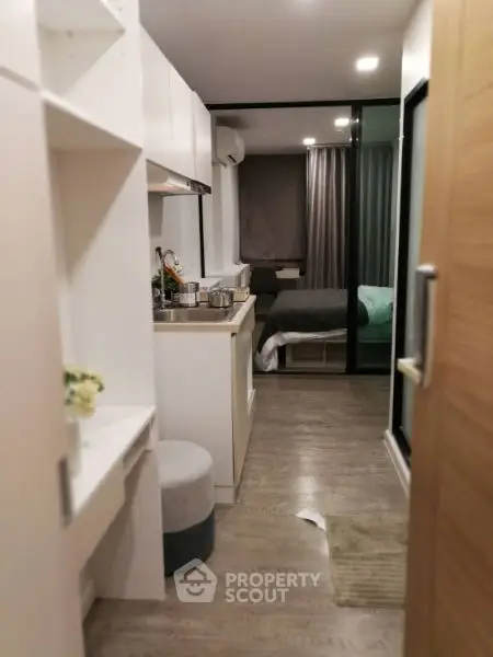 Luxurious modern living room with elegant decor and ambient lighting.