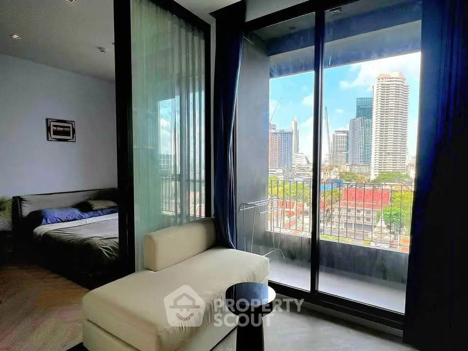 Modern apartment with stunning city view from the living room and bedroom.