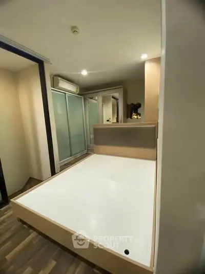 Modern bedroom with sleek design and built-in storage solutions