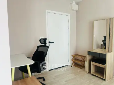 Modern study room with sleek desk, ergonomic chair, and stylish storage solutions.