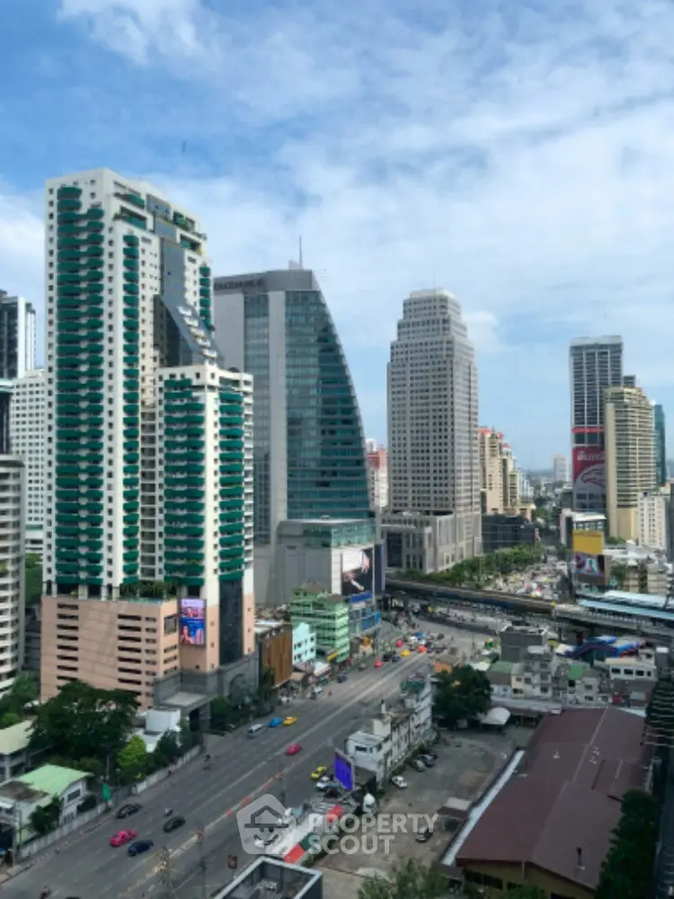 Stunning cityscape view showcasing modern skyscrapers and bustling urban life.