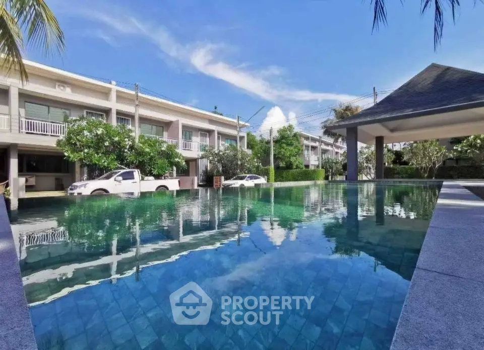 Luxurious residential complex with stunning pool and modern architecture