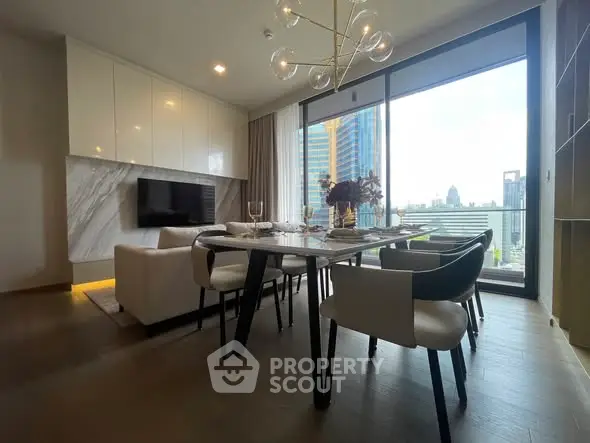Modern dining area with city view, elegant decor, and natural light.