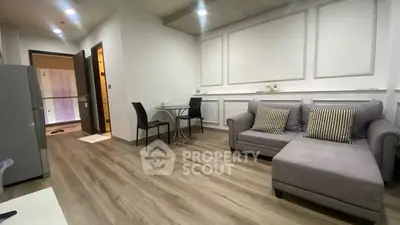 Modern living room with stylish decor and cozy seating area