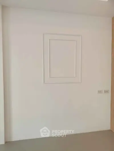 Minimalist interior wall with modern design and neutral tones