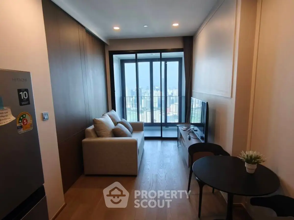 Modern living room with city view and cozy furnishings