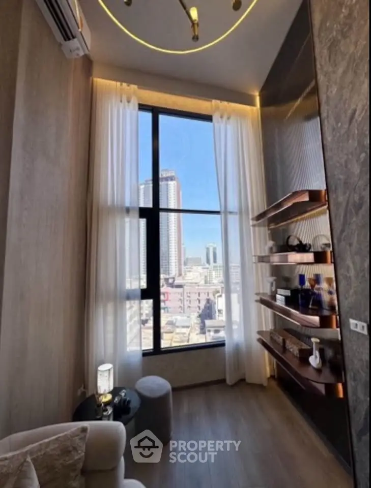 Luxurious high-rise apartment with stunning city view and elegant interior design.