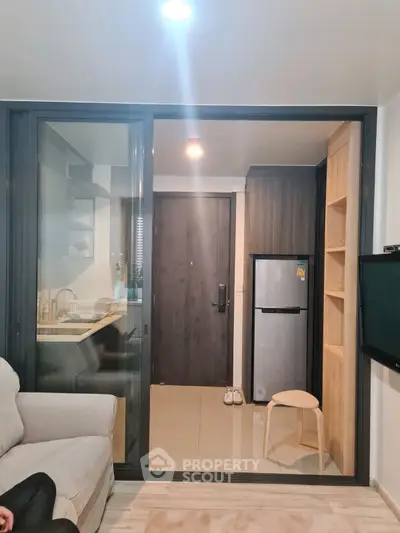 Modern compact apartment with open kitchen and cozy living area