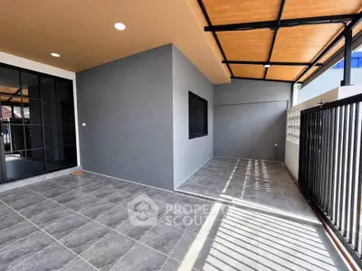 Modern outdoor patio with sleek design and ample space for relaxation.