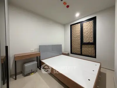 Modern minimalist bedroom with wooden bed frame and stylish window design