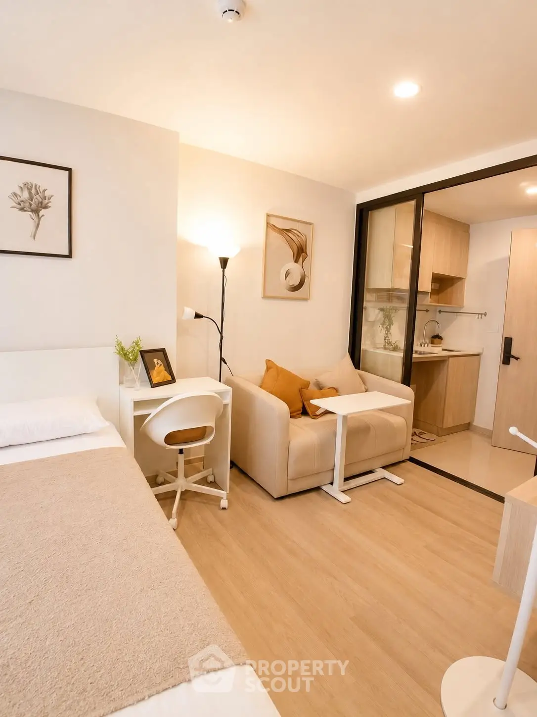 Cozy studio apartment with modern decor and open kitchen layout