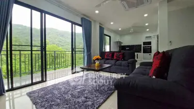 Spacious living room with stunning mountain view and modern furnishings