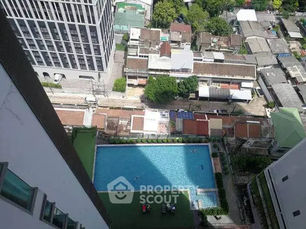 Stunning aerial view of urban residential area with a refreshing swimming pool