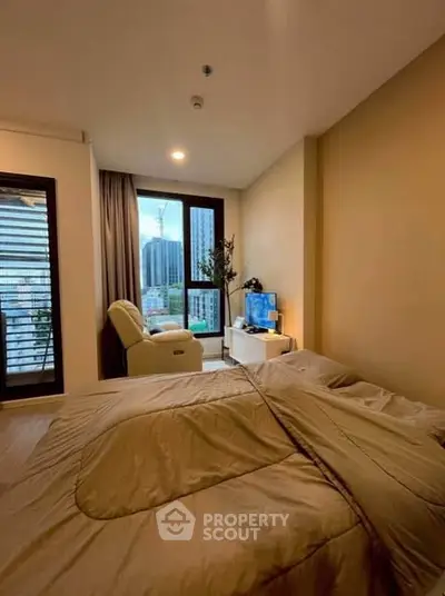 Cozy bedroom with city view and modern decor