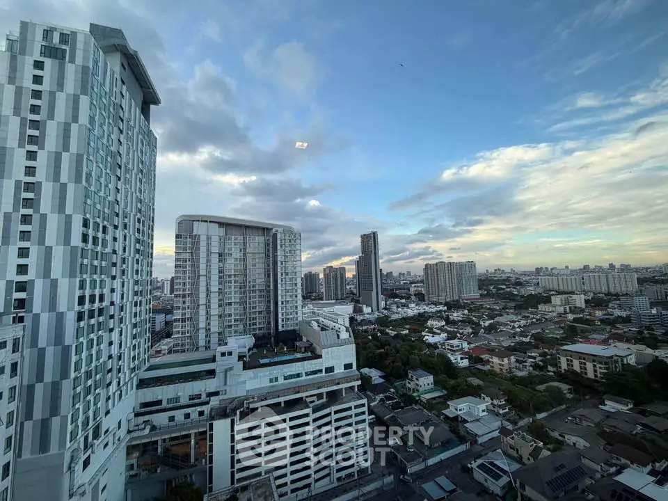 Stunning cityscape view from a high-rise building, showcasing modern architecture and expansive skyline.
