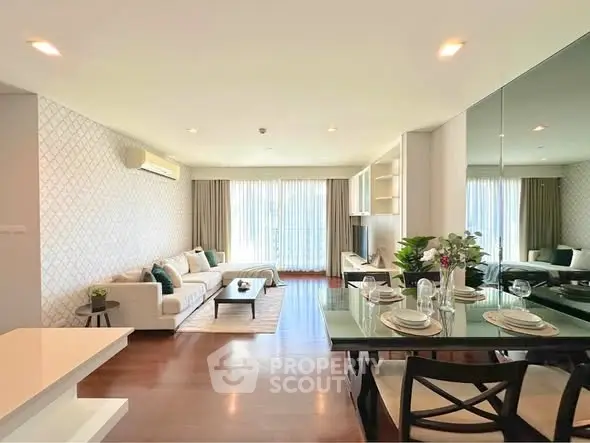 Spacious modern living room with elegant dining area and natural light
