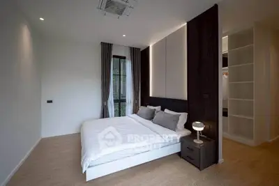 Modern minimalist bedroom with cozy lighting and elegant decor