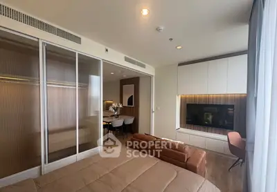 Modern living room with stylish furniture and built-in storage, perfect for urban living.