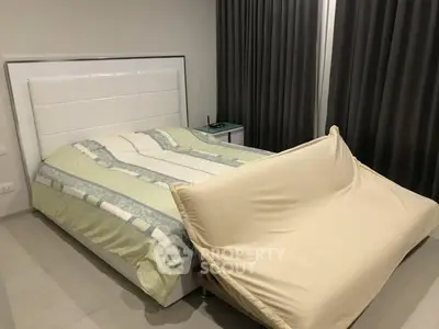 Modern bedroom with stylish bed and sleek curtains
