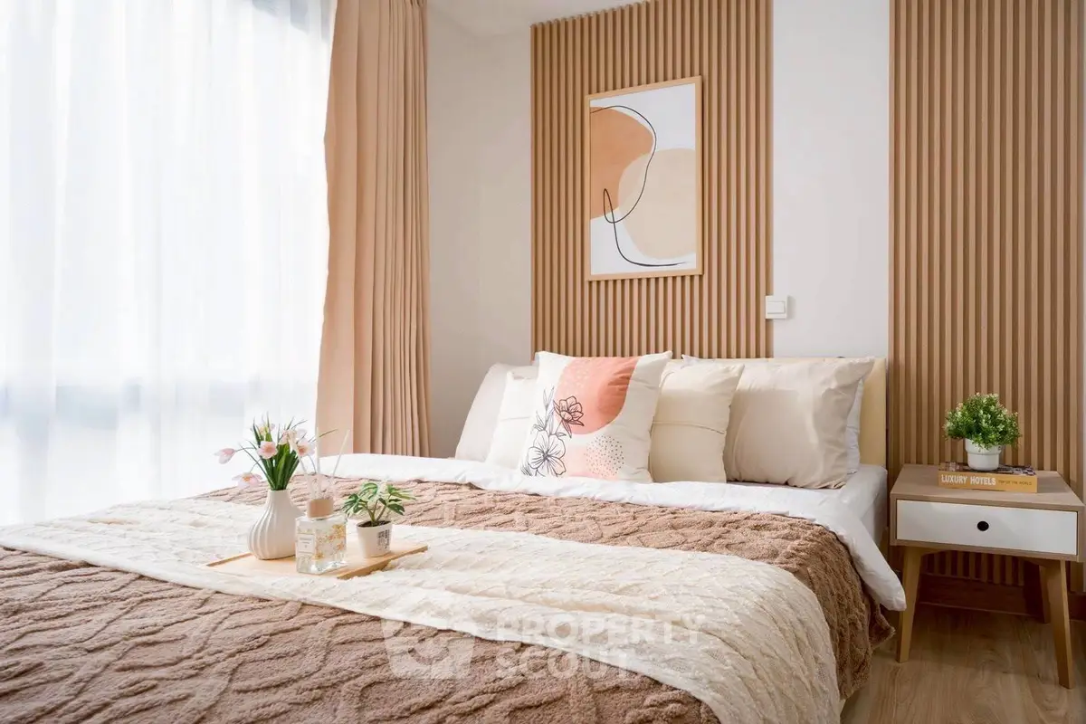 Cozy modern bedroom with stylish decor and natural light