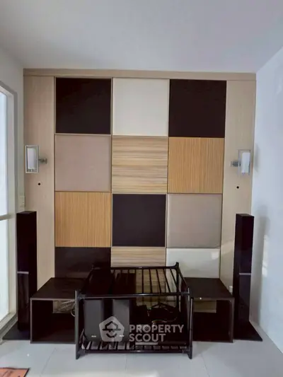 Modern interior with stylish wall paneling and sleek lighting fixtures