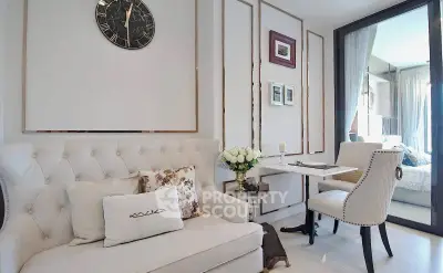 Elegant living room with plush seating and stylish decor in modern apartment
