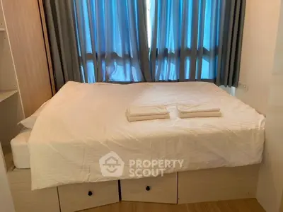 Cozy bedroom with built-in storage and natural light