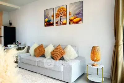 Stylish living room with modern decor and cozy sofa in bright apartment
