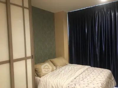 Cozy bedroom with elegant wallpaper and dark curtains