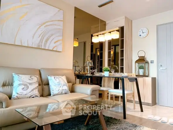 Stylish modern living room with elegant decor and cozy seating area.