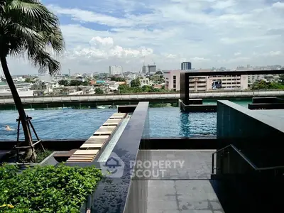 Luxurious rooftop pool with stunning city views and modern design, perfect for relaxation and leisure.