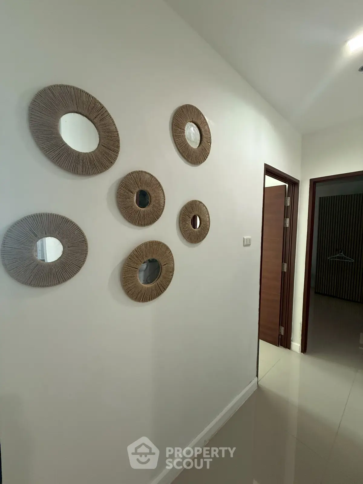 Stylish hallway with decorative wall mirrors and modern design