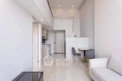 Modern loft apartment with high ceilings, open layout, and stylish furnishings.