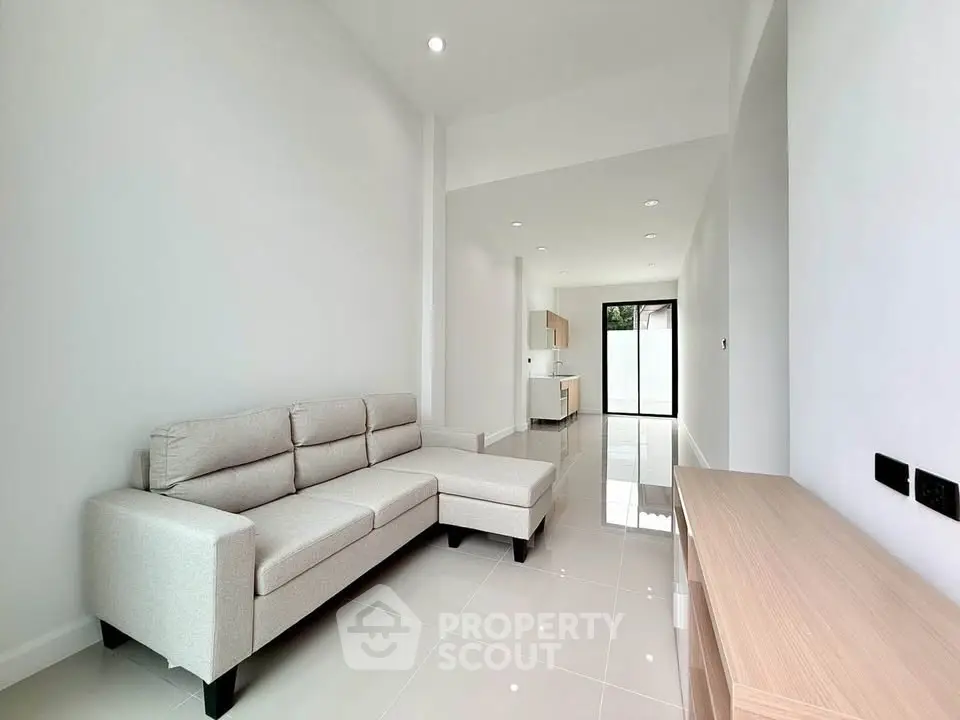 Spacious modern living room with sleek design and natural light