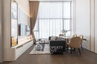 Modern living room with high ceilings and elegant decor