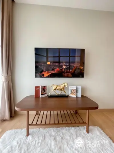 Stylish living room with modern decor and city view from window.