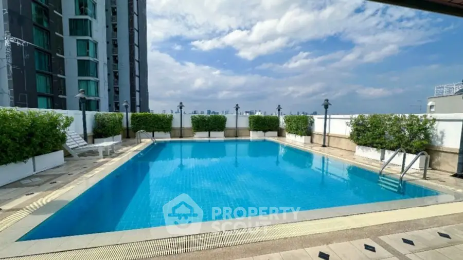 Stunning rooftop pool with city views and modern design.